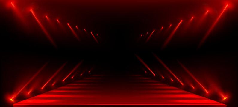 Fashion show runway with red lights on black background. Vector realistic illustration of long podium perspective illuminated with color floodlights, neon lamps glowing in smoke, catwalk design