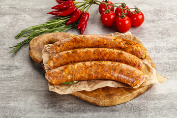 Raw sausages with spices and herbs