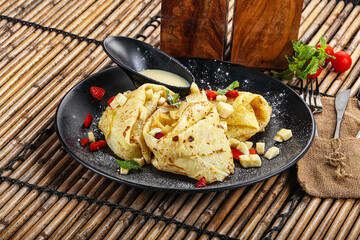 Sweet banana pancake with honey