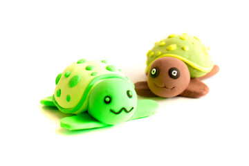 turtle made of air clay on a white background. kids crafts