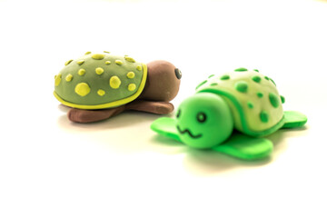 turtle made of air clay on a white background. kids crafts