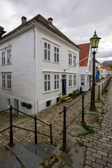 Peaceful old town alley lined with cobblestones in Bergen, Norway