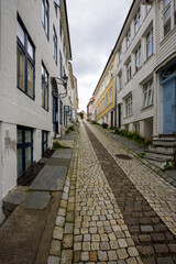 Charming old town alley with scenic cobblestone street in Bergen, Norway