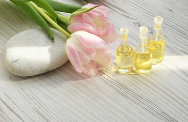 White spa stone and aroma oils with space for text. Meditation and minimalism. copyspase flatlay, spa