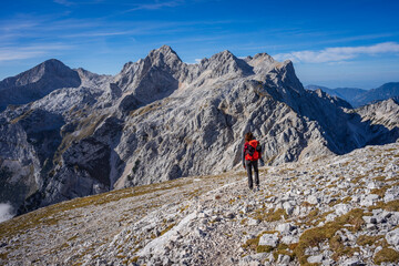 mountaineer woman front Turska Gora mountain, 2251 meters,from top of Brana peak (2253 m), Kamnik-Savinja Alps, Europe,, Slovenia, Central Europe,