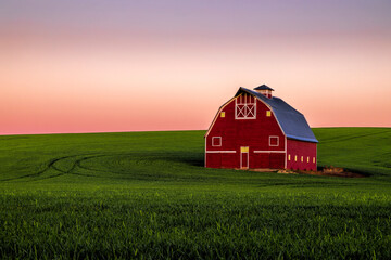 Dawn breaks over a red barn in the Palouse of eastern Washington state © Andrew S.