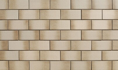 Classic ceramic tiles in beige color with brown hues. Interior or exterior wall covering. Background and texture