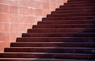 steps of an empty stone granite staircase close up