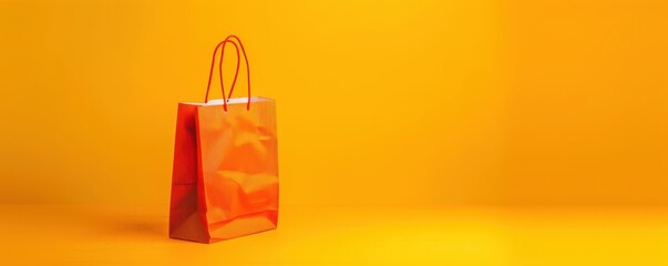 A yellow background with a shopping bag and leaves. Free copy space for text.