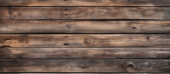 Obraz premium Copy space image of a weathered horizontal plank wall provides a rustic backdrop.