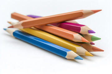 Fototapeta premium Assorted Colored Pencils Piled up on a White Background