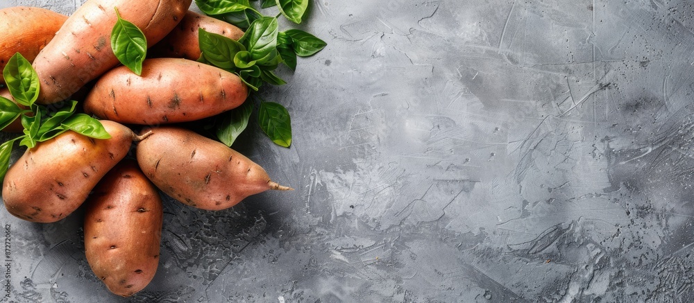 Poster Sweet potatoes displayed on a blank background with copy space image.