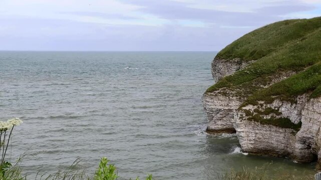 view of the coast, chalk cliffs, North Sea high tide, sky and the horizon, (limestone cliffs), seascape