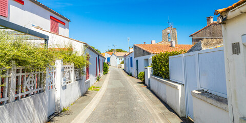 Narrow street of the village of La Brée-les-Bains, France on Oleron island