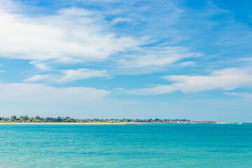 Fototapeta premium Beach and marina of Saint-Denis d'Oleron seen from La Bree les Bains beach