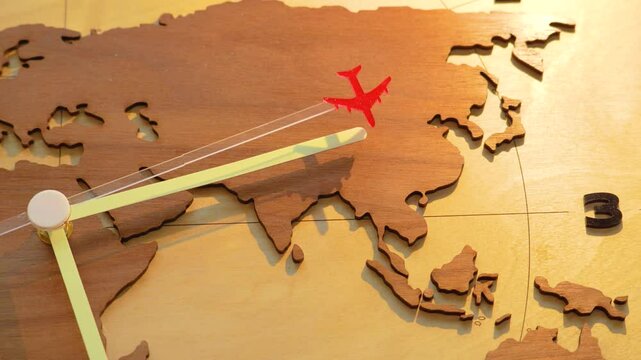 World map plane time zone, seconds hand, hours flight across continents. Concept of jet lag, acclimatization, adaptation, biorhythms. Intercontinental flight America, Europe, Asia, Africa world.