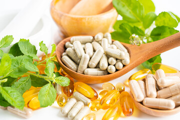 Alternative medicine herbal organic capsule with vitamin E omega 3 fish oil, mineral, drug with...