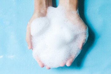 Fototapeta premium hand with soap bubbles