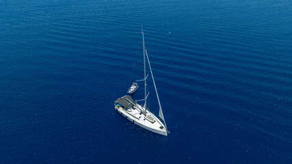 Aerial view of a sail boat on the shallow water. 