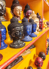 Small souvenir Gods heads sold at the gift store in Kathmandu