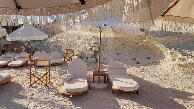 Blue flag beach club in Izmir Cesme Alacati, beach umbrellas, chairs, beach party in