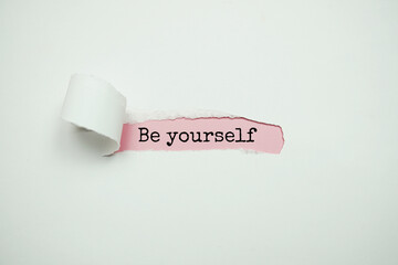 Be yourself text message on pink background