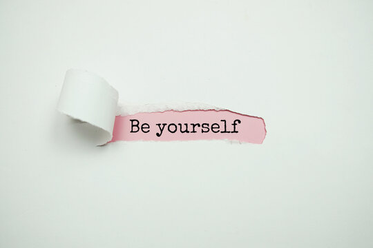 Be yourself text message on pink background