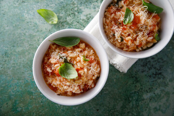 Homemade tomato risotto with basil