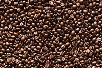 Obraz premium Coffee beans lie in an even layer