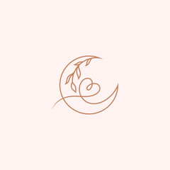 Luxury crescent moon logo design with leaf and heart decoration