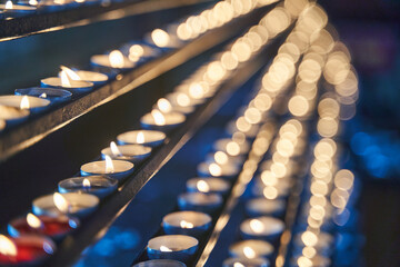 Many candles burn in a temple in Vienna. High quality 4k footage.