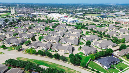 Aerial view premier active adult communities and nursery homes, commercial building warehouse, city...