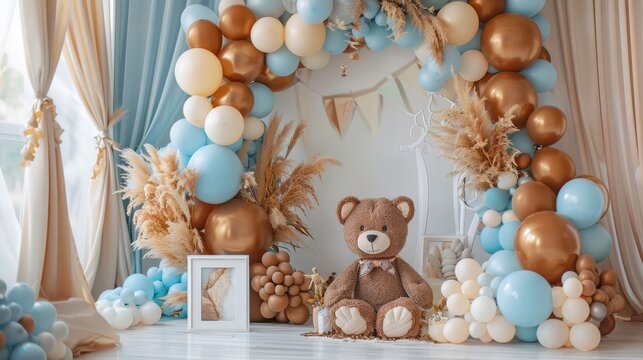Beige, brown, and blue balloons backdrop, arch with bears. Photo-wall for celebration baptism or birthday party. Trendy autumn decor with dry leaves.