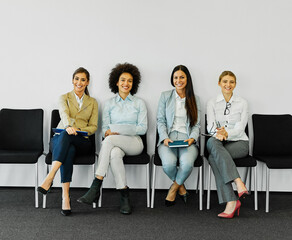 woman business chair sitting waiting businesswoman candidate recruitment office businessperson job young interview line employee career row hall colleague