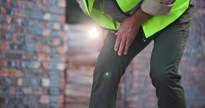 Hands, knee and architect man with injury, joint and leg inflammation from arthritis. Construction worker, acl pain and tension from manual labour for male person and medical accident on job site