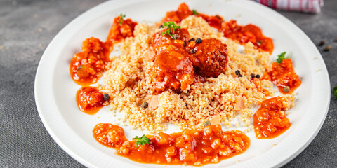 couscous with meat balls vegetable sauce tasty fresh meal food snack on the table copy space food background rustic top view keto or paleo diet