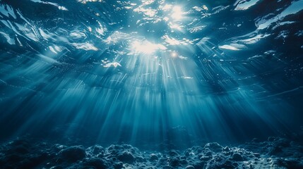 Underwater scene with light rays shining through the water
