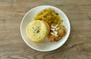 fried rice Japanese curry topping egg omelet eat couple crispy fried chicken dressing mayonnaise and potato salad on plate