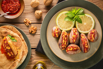 Arabic Cuisine; Makdous is a traditional Lebanese preserve made from baby eggplants stuffed with walnuts, red peppers, chili and garlic.