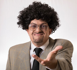 Male hand in a suit shows a palm up gesture 