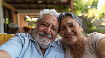 Spain retirement vacation: relax, grin, and senior couple selfie on outdoor couch. Happy, communicating, old man and woman with memory snapshot, streaming, and social app