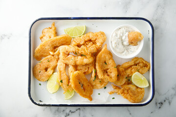 Deep fried squid rings with lime