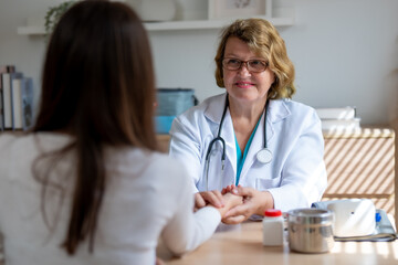Teen Girl in Counseling Session with Social Worker or Psychologist Discussing Depression and Mental...