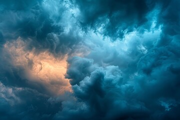 Abstract background of dark stormy clouds with blue sky 