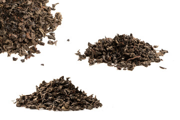 Dried tea leaves isolated on a white background.