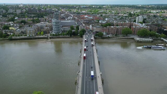 The drone aerial footage of Putney Bridge and Putney area of London, UK. Putney is an affluent district of south-west London, England, in the London Borough of Wandsworth.