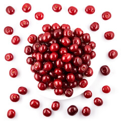 Ripe red cherries on plate isolated on white background