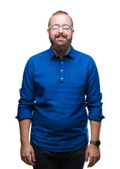 Fototapeta premium Young caucasian hipster man wearing glasses over isolated background with a happy and cool smile on face. Lucky person.