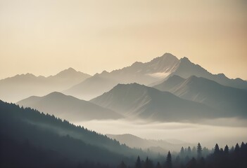 Obraz premium Beautiful high mountains surrounded by clouds and fog