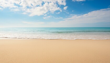 Photo of an empty beach overlooking the sea horizon and blue sky. Relaxation, vacation, space for commercial use.